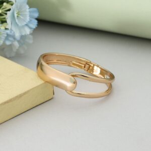 Asymmetric Hook-Loop Sculptural Bangle – Gold Tone