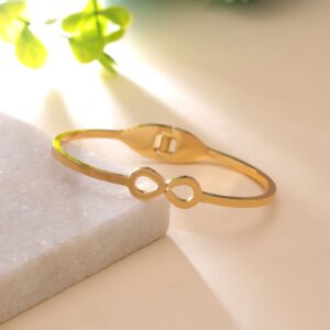 Gold minimalist infinity cutout hinged bangle