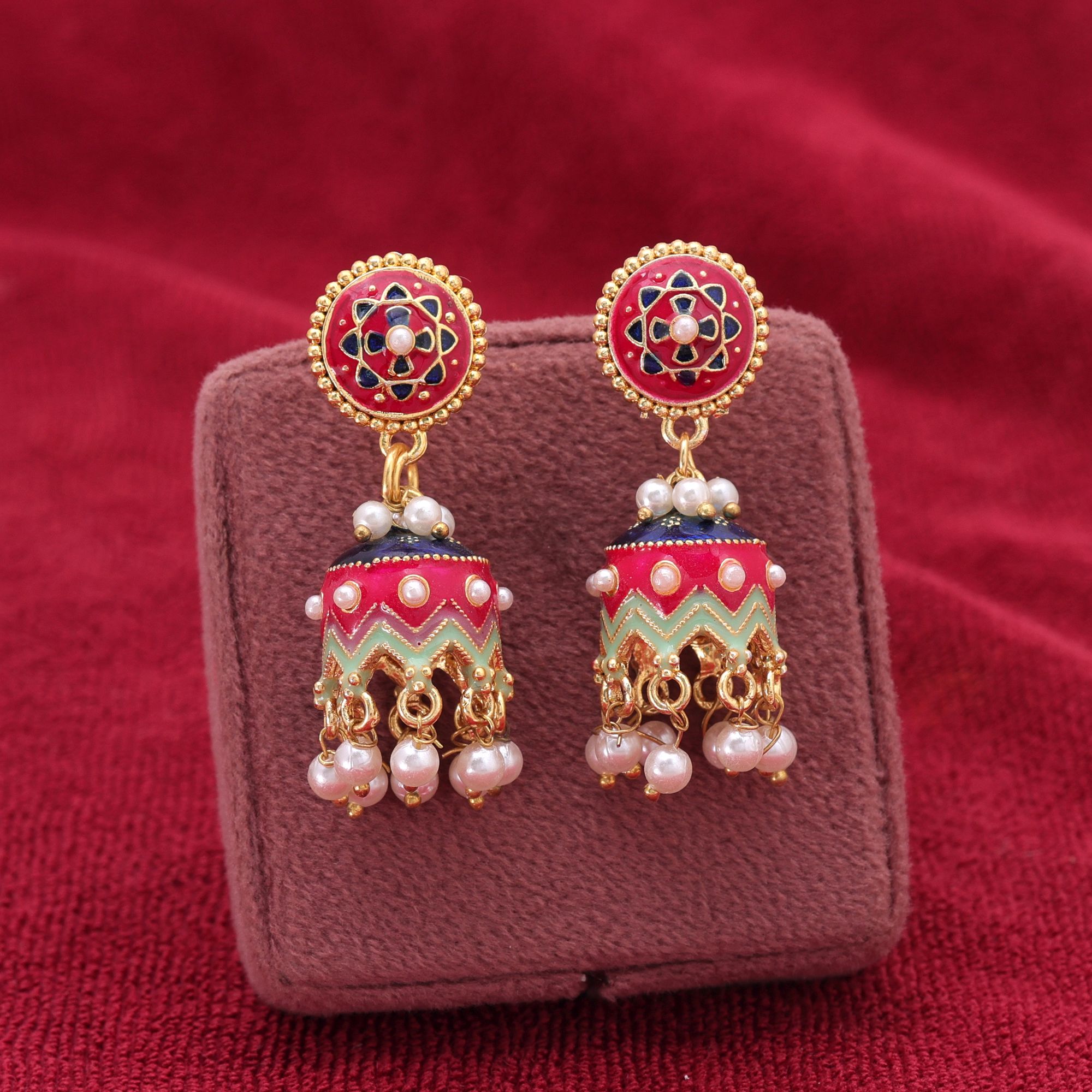 Traditional Indian Meenakari jhumka earrings with floral work and hanging faux pearls