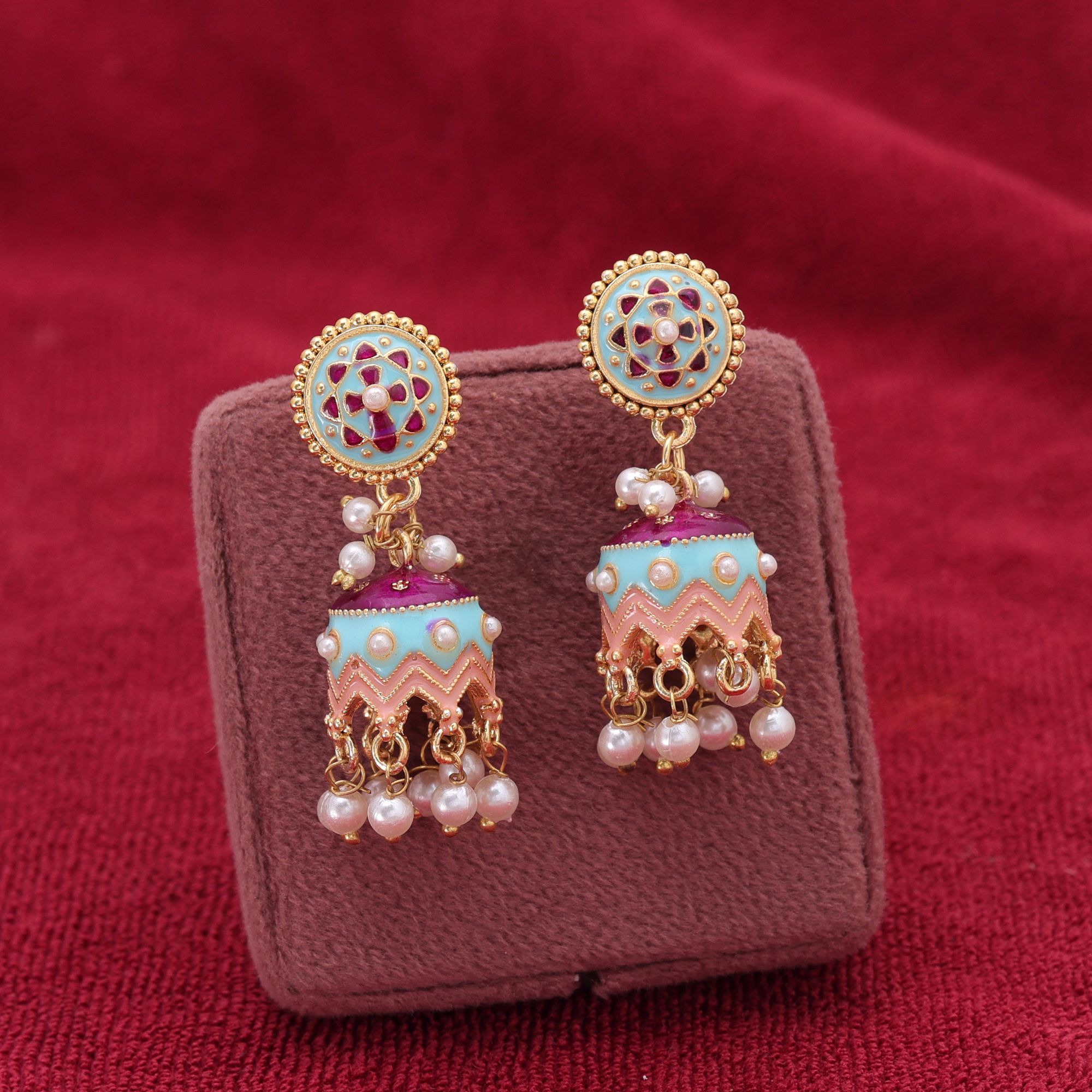 Traditional Indian Meenakari jhumka earrings with floral work and hanging faux pearls