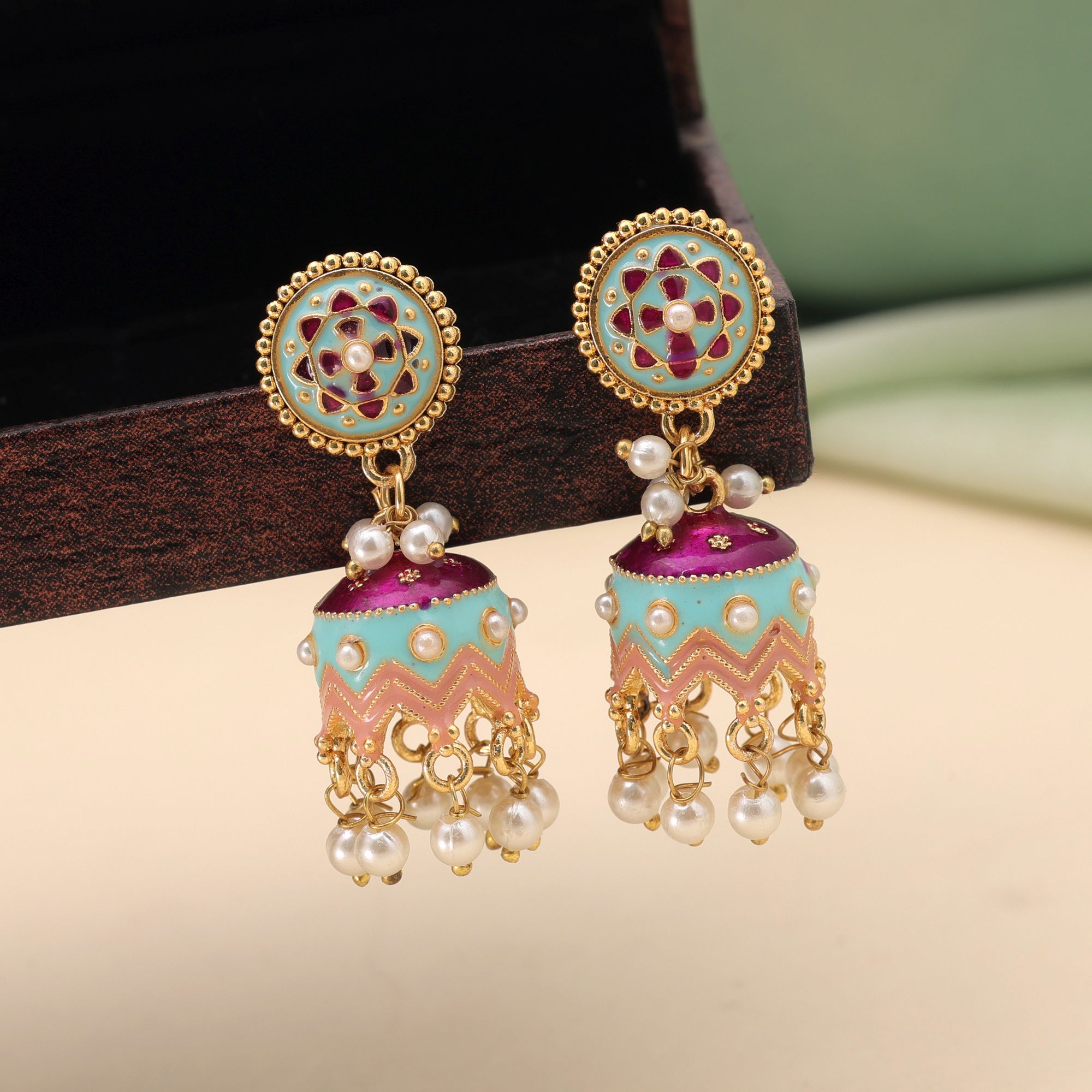 Traditional Indian Meenakari jhumka earrings with floral work and hanging faux pearls