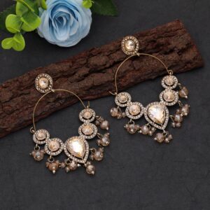 An elegant pair of champagne gold hoop chand bali earrings decorated with multi-shaped glass stones, textured gold borders, and delicate dangling faceted champagne glass beads.